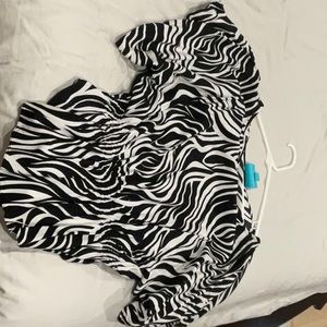 Black and white Women’s blouse.  Size L